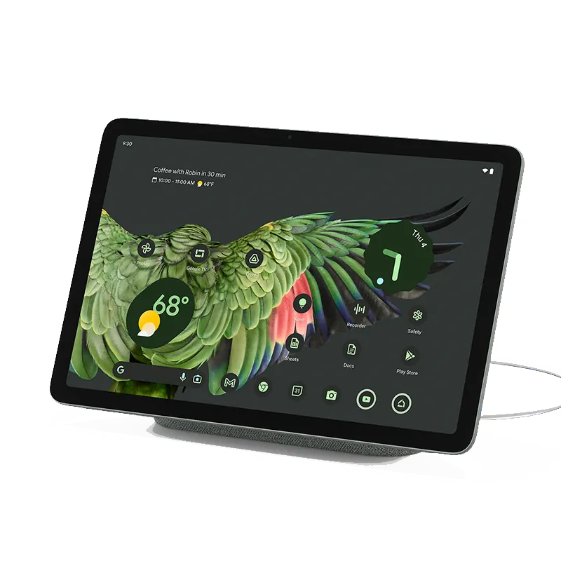 Google Pixel Tablet màu Hazel đặt trên đế sạc kiêm loa thông minh