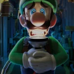Luigi đang hút hồn ma trong Luigi's Mansion 3, một game phiêu lưu giải đố độc đáo trên Nintendo Switch.