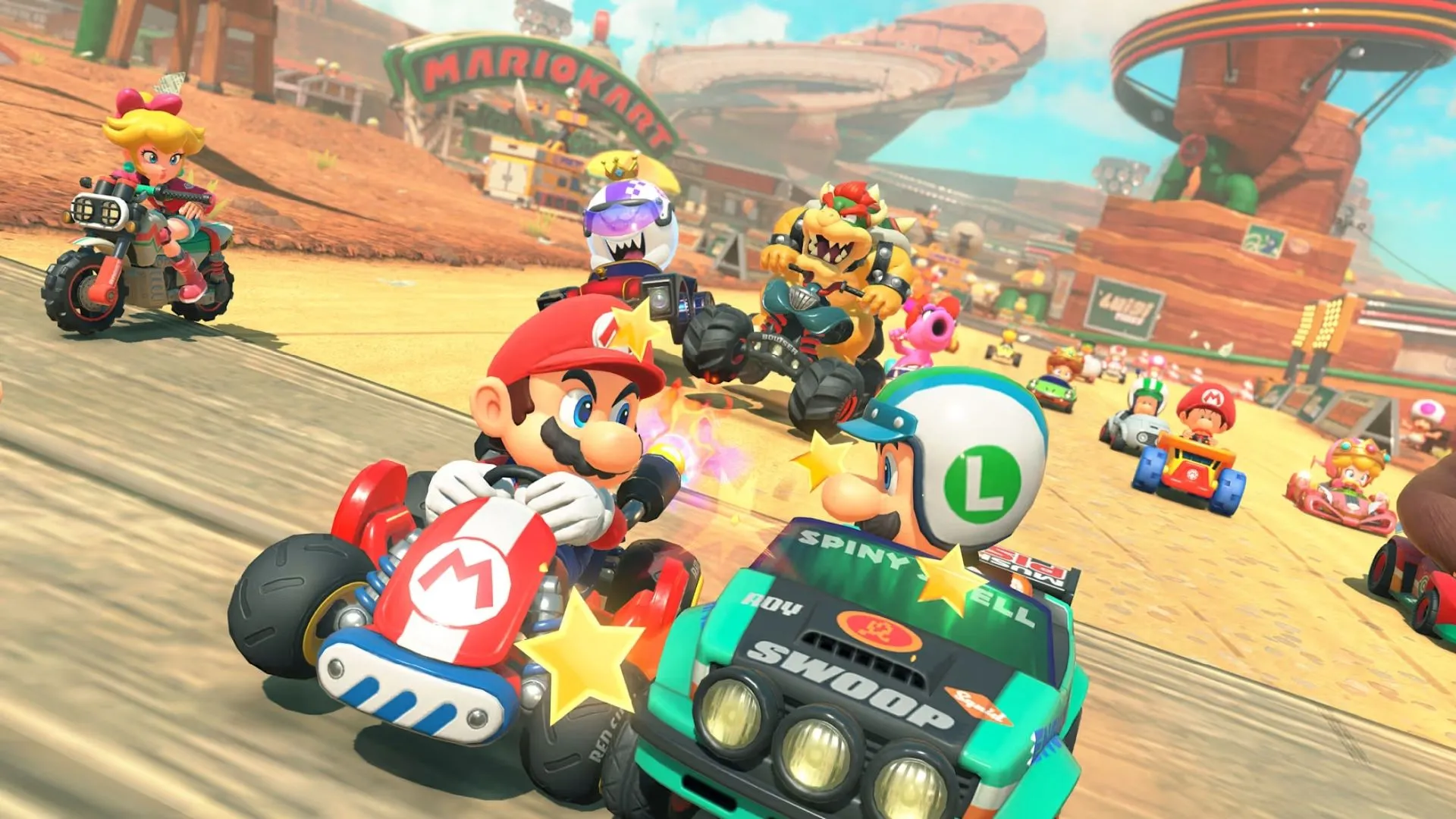 Luigi đang né tránh chướng ngại vật trên một đường đua Mario Kart World đầy màu sắc
