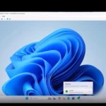 Màn hình Windows 11 minh họa tính năng Cross Device Resume với biểu tượng Spotify trên thanh tác vụ