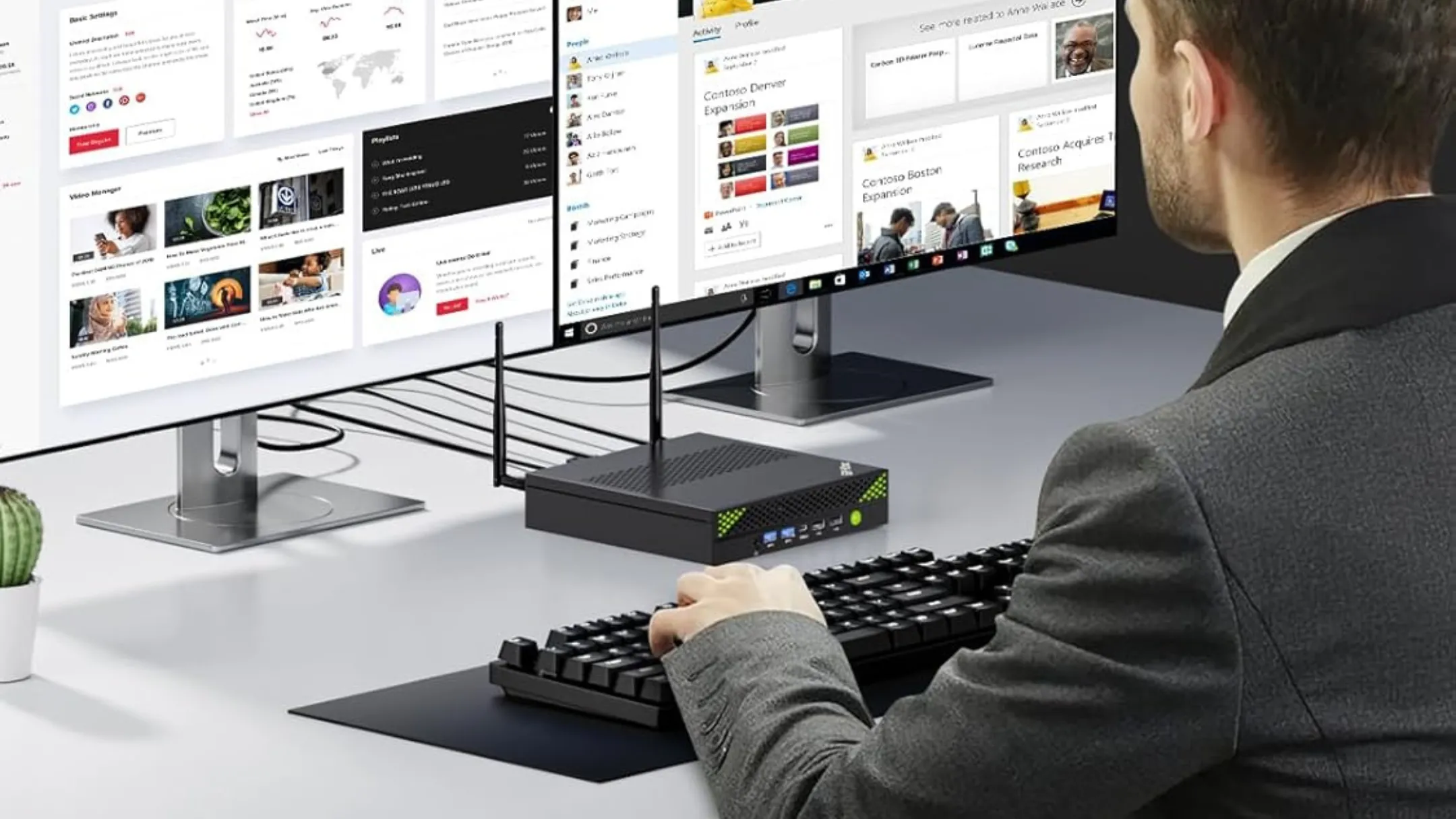 Người dùng trải nghiệm GMKtec Mini PC trong môi trường làm việc chuyên nghiệp, nổi bật hiệu năng