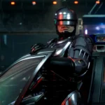 RoboCop trong bộ giáp kim loại bước ra từ xe cảnh sát trong game RoboCop Rogue City, thể hiện lối chơi bắn súng góc nhìn thứ nhất.